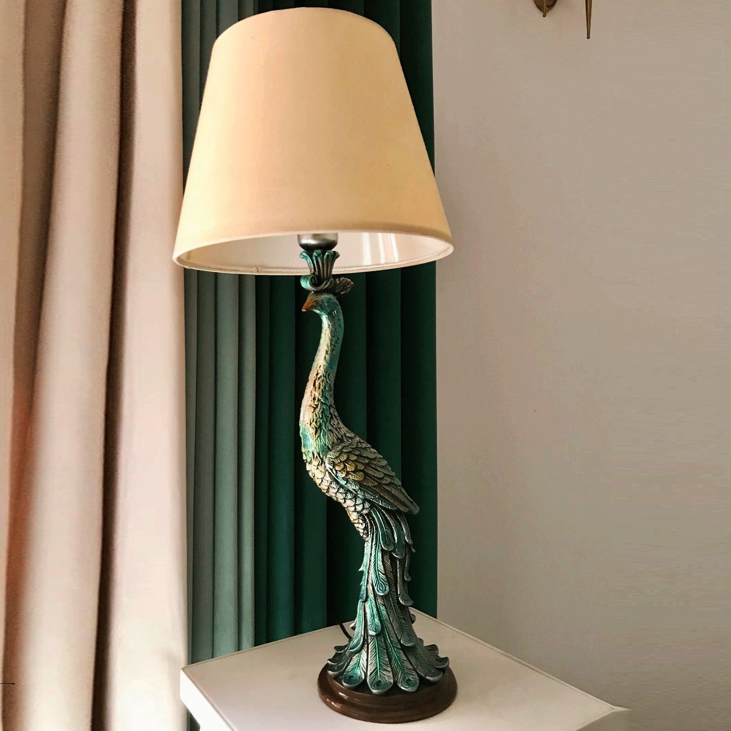 Verdant Peacock lamp, with iridescent teal and gold feather detailing and cream fabric shade — decorative art sculptures and green table lamps by Lume Art Gallery Verdant Peacock lamp, with iridescent teal and gold feather detailing and cream fabric shade — decorative art sculptures and green table lamps by Lume Art Gallery