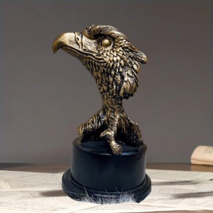 Gold eagle sculpture bust with intricate feather detail on black base – animal sculpture art by Lume Art Gallery