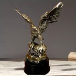 Eagle Bird Sculpture — gold bird sculpture on rocky base, premium art sculptures for sale at Lume Art Gallery