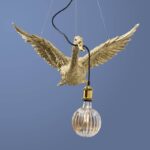Gold Flying Duck — sculpted duck decor bird sculpture pendant light in radiant gold polyresin, a statement art sculpture for modern home interiors