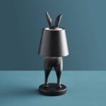 Matte Black Rabbit Lamp — LED hiding rabbit animal lamp in polyresin, 28 cm, compact black table lamps for modern living rooms and home decor