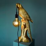 Gold Parrot Table Lamp — sculptural gold deco art lamp in polyresin, 61 cm tall, by Lume Art Gallery