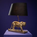 Tiger Table Lamp Gold-Black — sculptural animal lamp with black detail. One of the gold table lamps crafted from polyresin and metal for modern living room décor