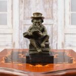 Monkey Reading Book Sculpture – bronze-finish animal sculpture with top hat and spectacles, a unique art sculpture for modern home decor and home decor displays