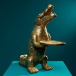 Transform your living space with the Crocodile Morty Gold Artistic Table, where functional furniture meets museum-quality craftsmanship.