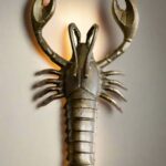 BRASS-EFFECT LOBSTER WALL LIGHT