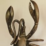 BRASS-EFFECT LOBSTER WALL LIGHT