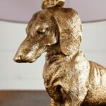 The Icon Table Lamp Dog Edition Dachshund in antique gold — sculptural animal lamp with gold leaf finish and intricate fur detail, UL Listed modern living room lamps