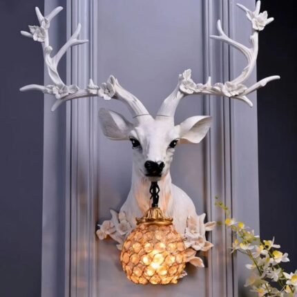 White Deer Antler Lamp with white floral antlers and crystal globe — luxury animal lamp and decorative wall light by Lume Art Gallery