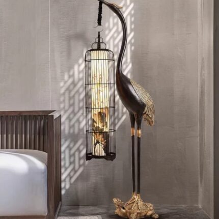 Crane Art Sculpture with hanging lantern — bronze-finish bird sculpture and modern animal sculpture for wooden home decor