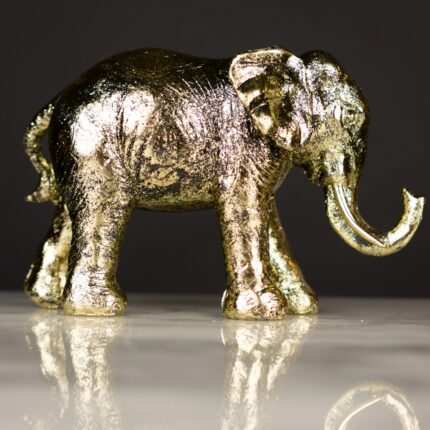 Gold Elephant Sculpture with distressed finish — premium animal sculpture and art sculpture for home decor, available as sculptures for sale at Lume Art Gallery