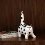 Stretch Cat Sculpture – black and white resin animal sculpture in a stretching pose, modern art sculpture for home decor