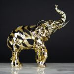 Gilded Elephant Sculpture, in gold iron with intricate openwork design — premium animal sculpture and art sculpture for home décor by Lume Art Gallery