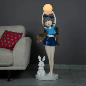 Tripod Floor Lamps: Your Mid-Century Style Guide 2 Chrome tripod floor lamp providing reading light in contemporary space