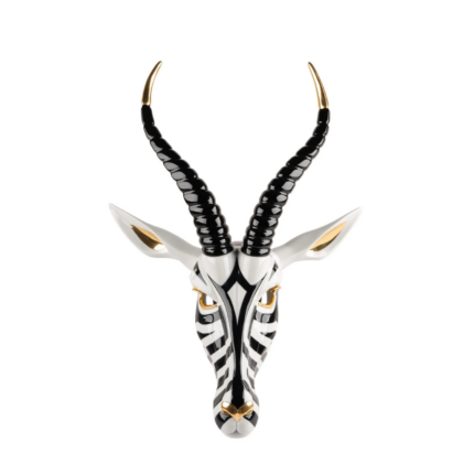 Gold luster and gloss finish detail of ANTELOPE MASK BLACK AND GOLD, porcelain wall mask designed by José Luis Santes