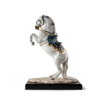SPANISH PURE BREED WHITE HORSE SCULPTURE performing a courbette with ornate blue and gold luster tack