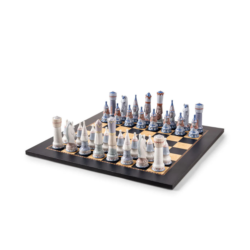 LLADRO MEDIEVAL CHESS SCULPTURE by Juan Ignacio Aliena — 32 gloss pieces in blue and white on lacquered wood board LLADRO MEDIEVAL CHESS SCULPTURE by Juan Ignacio Aliena — 32 gloss pieces in blue and white on lacquered wood board