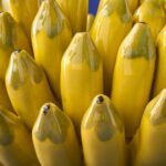 DECORATIVE YELLOW VASE BOWL WITH BANANA DETAIL