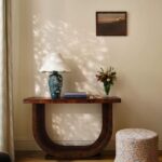 TABLE LAMP WITH CARVED CERAMIC DESIGN AND SCALLOP SHADE