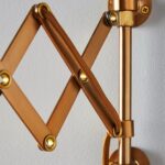 GRETA SCALLOPED ACCORDION WALL LIGHT WITH BRASS SLATE FINISH