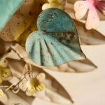 IRON WALL SCONCE WITH FLORAL HEART DETAIL