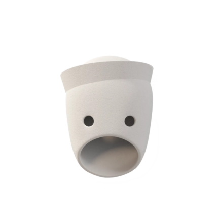 THE PARTY GLENN WALL LAMP BY KRANEN GILLE — matte white cast ceramic face wall lamp with a flat sailor-brim hat, two circular eye openings, and wide oval mouth aperture