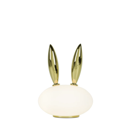 RABBIT PET TABLE LAMP BY MARCEL WANDERS — frosted opal blown glass oval body with two tall polished gold gilded porcelain rabbit ears and circular gold base