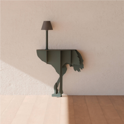 GREEN OSTRICH WALL LAMP by Rachel & Benoît Convers — flat cut ostrich body with slim pole table lamp, photographed against a textured cream wall