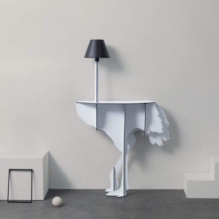 WHITE OSTRICH WALL LAMP by Rachel & Benoît Convers — flat cut white ostrich body with slim pole and dark lamp shade, styled in a minimal grey interior with geometric props