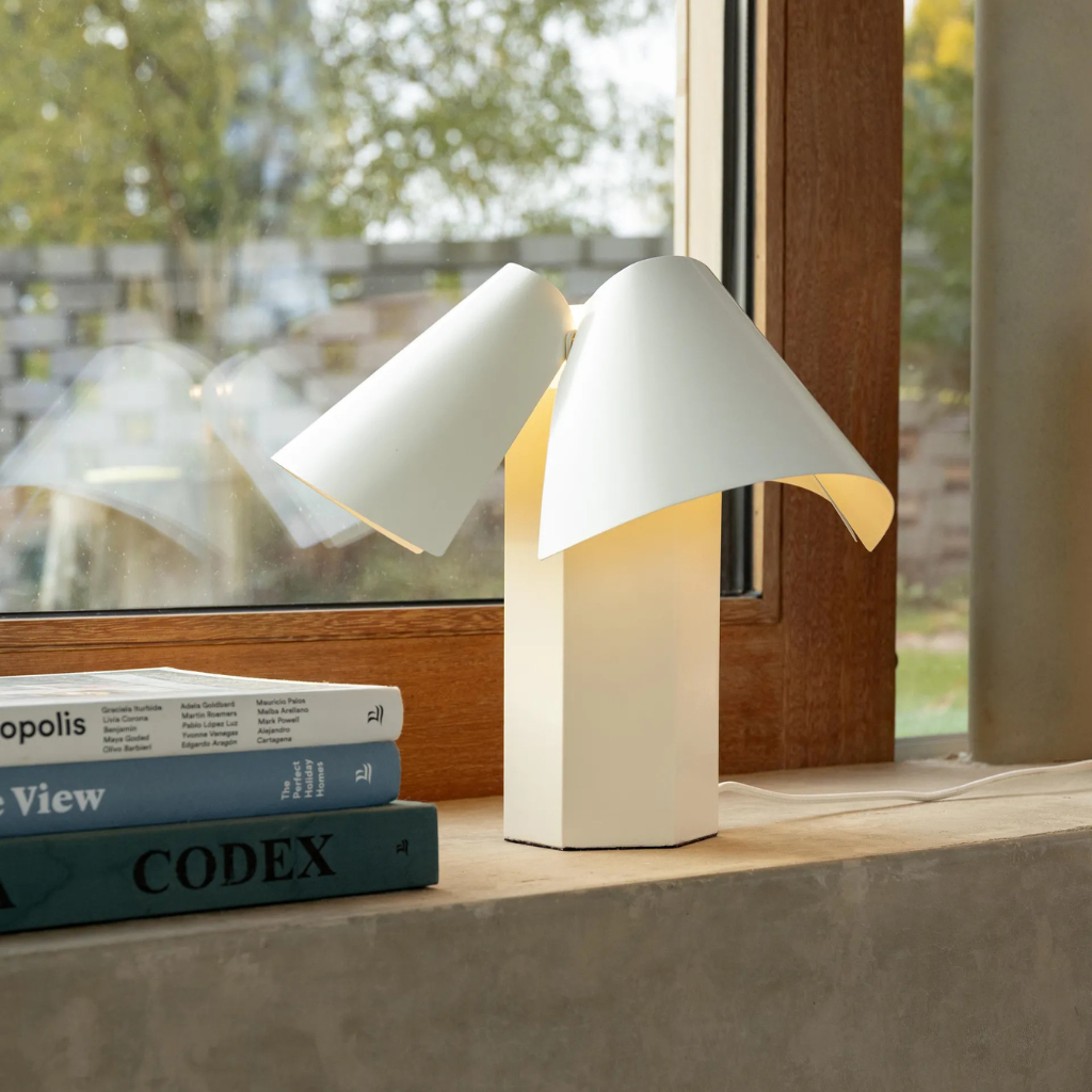 TABLE LAMP BELN OFF WHITE with solid hexagonal rectangular block base and three softly rolled overlapping curved metal shade panels TABLE LAMP BELN OFF WHITE with solid hexagonal rectangular block base and three softly rolled overlapping curved metal shade panels
