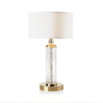 DRUM TABLE LAMP TRANSPARENT GOLD with tall textured clear Murano glass column, faceted gold finial, polished gold disc base, and white drum shade, handmade in Italy