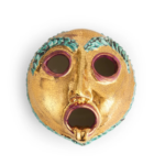 EXCLUSIVE RUAN HOFFMANN MASK BOX by Ruan Hoffmann with teal eyebrows and mauve-rimmed eye and mouth openings